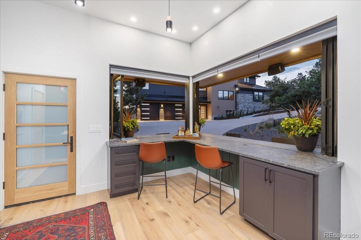 Office nook with window seating and mountain view