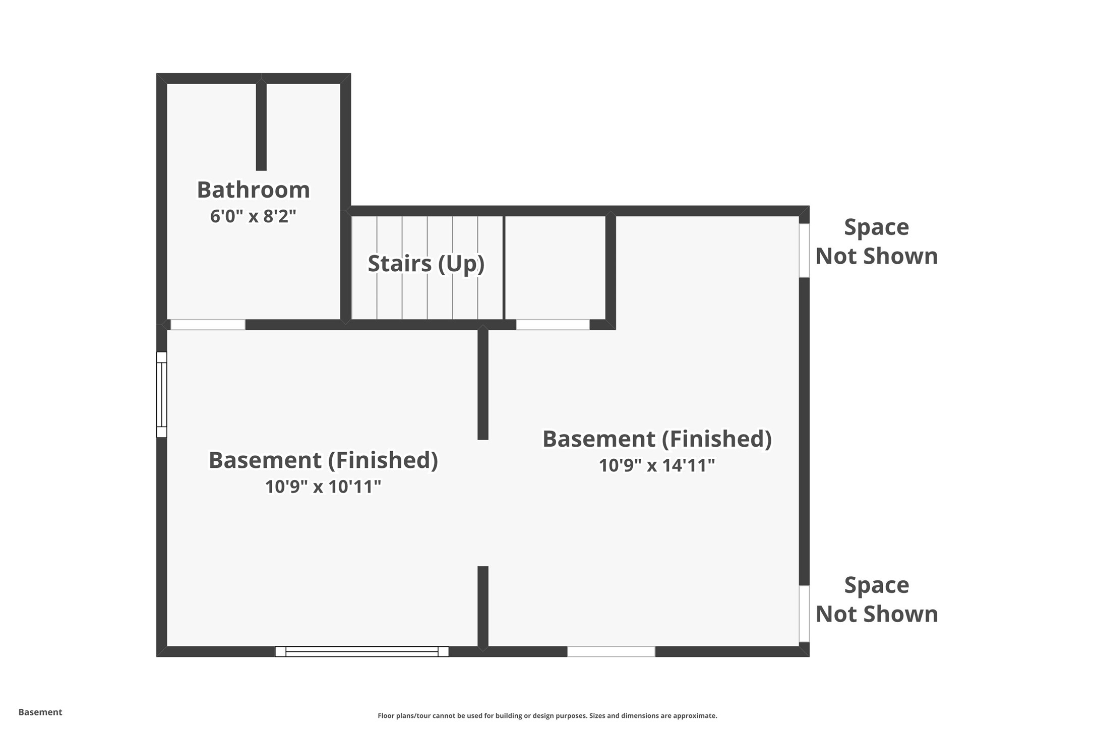 Basement floor plan with two finished rooms, a bathroom, stairs, and areas marked space not shown.