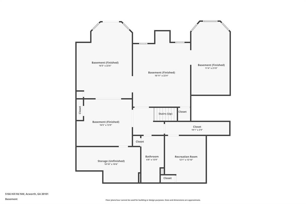 Basement floor plan showing finished areas, unfinished storage, a bathroom, recreation room, closets, and stairs.