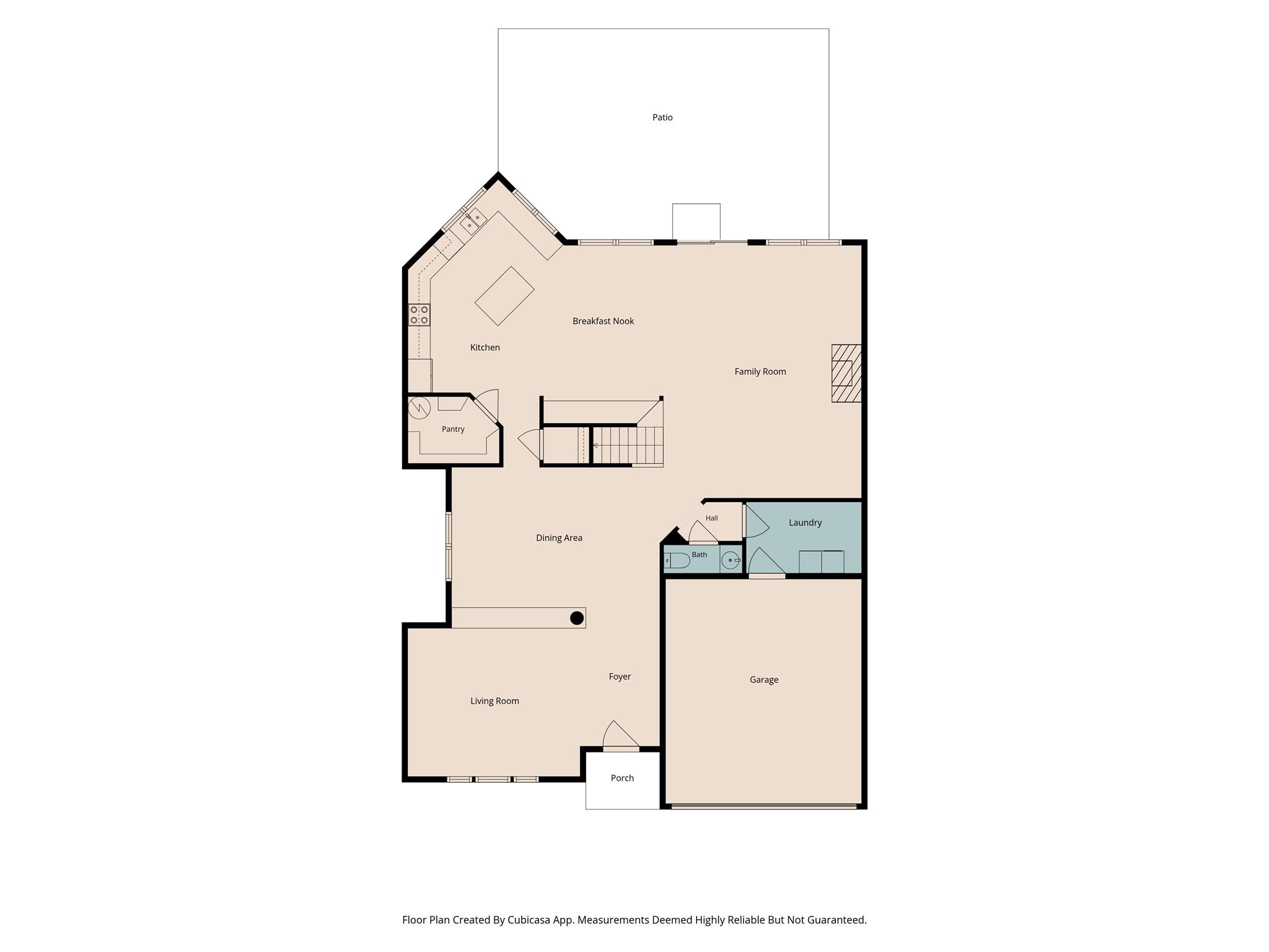First-floor plan showing living room, kitchen, family room, garage, patio, and porch.