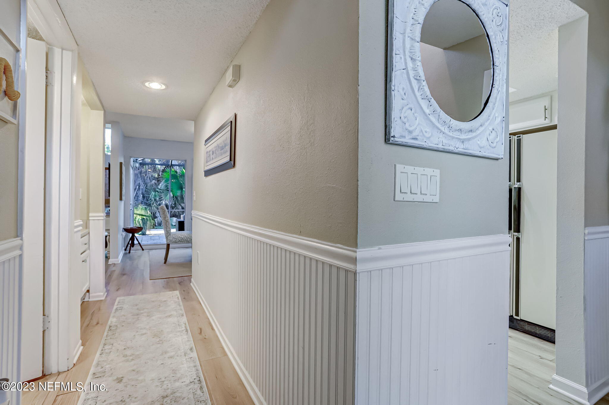 10025 SAWGRASS DR E