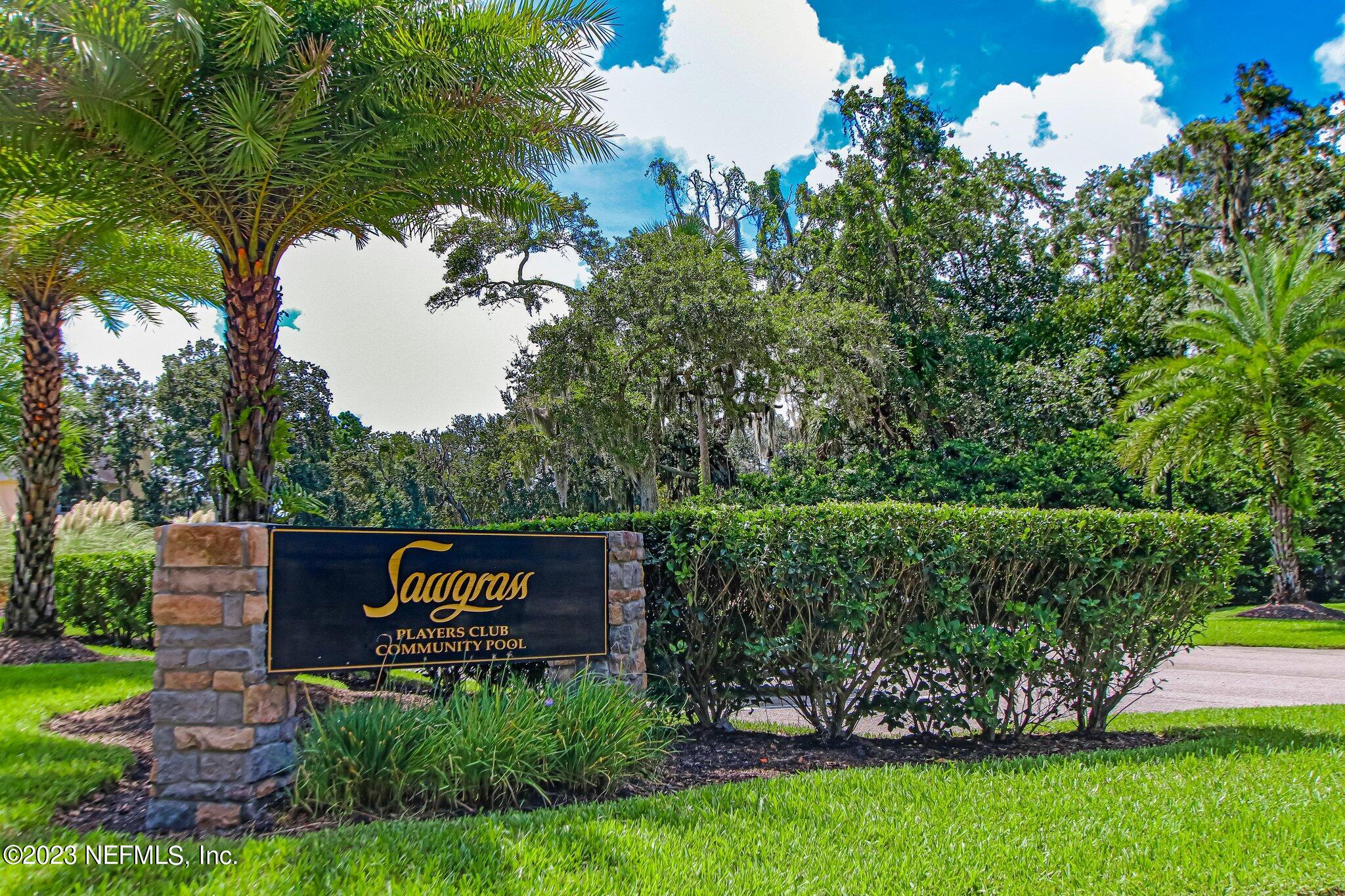 10025 SAWGRASS DR E