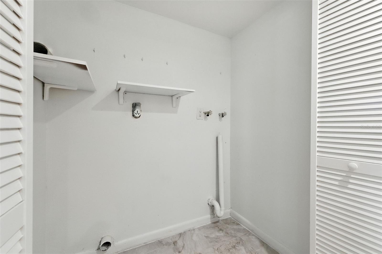 825 SOUTH VILLAGE DR N #201