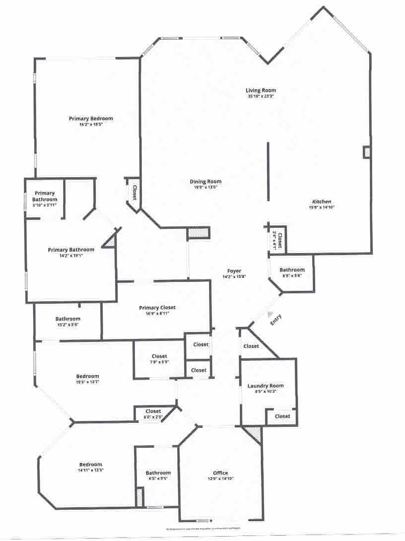 Floor plan with living and dining rooms, kitchen, three bedrooms, office, bathrooms, and laundry room.