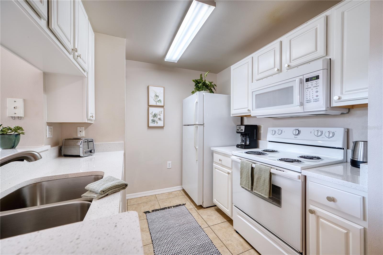 5551 BENTGRASS DR #11-303