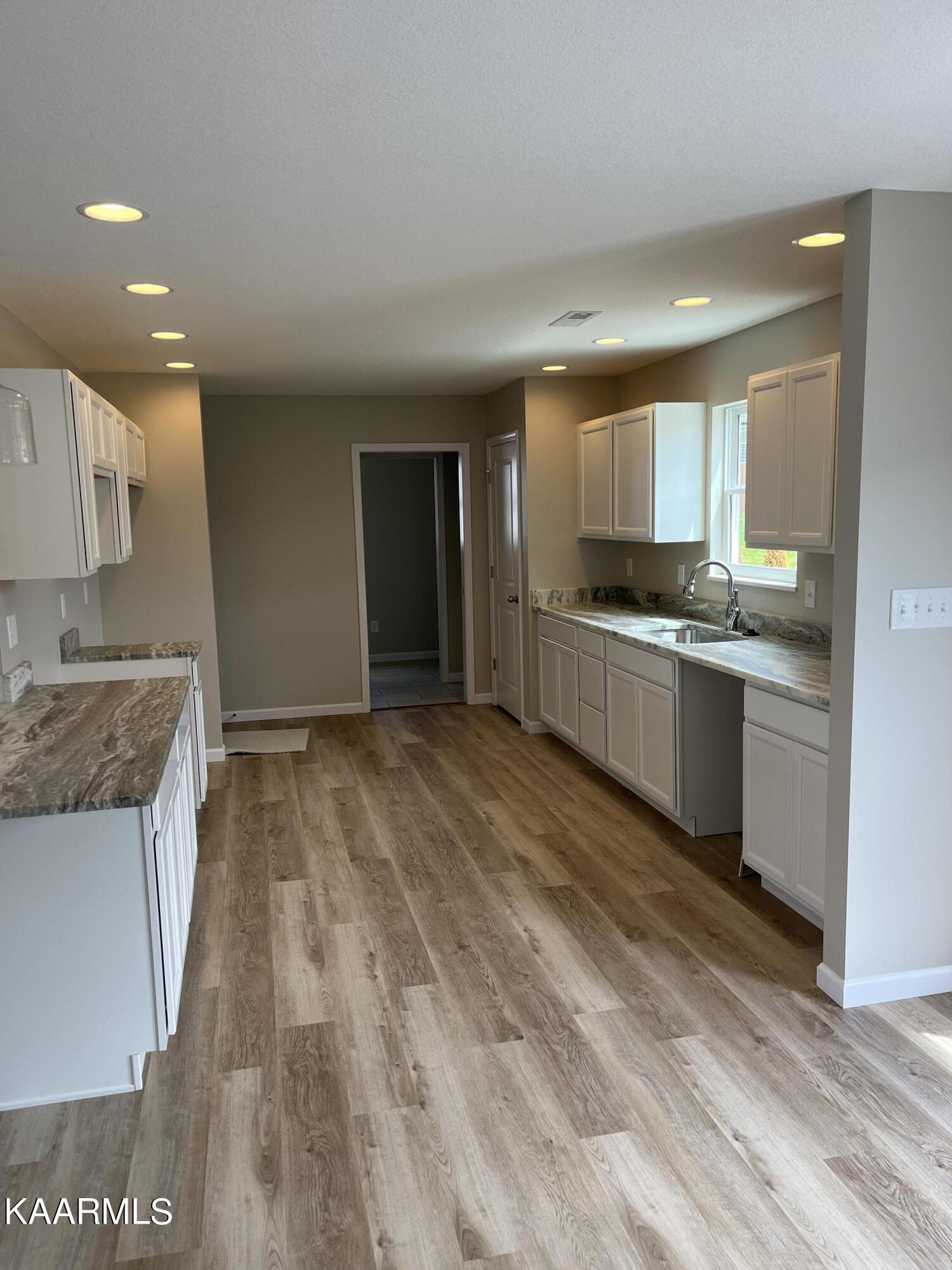 7704 Mossy Landing Lane