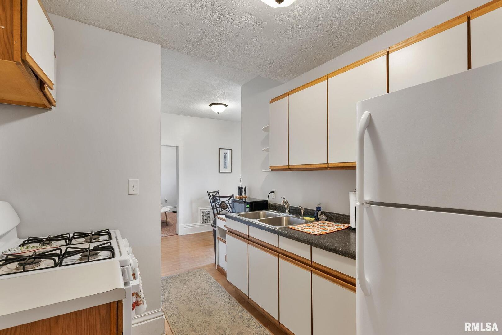 211 E LOCUST Street
