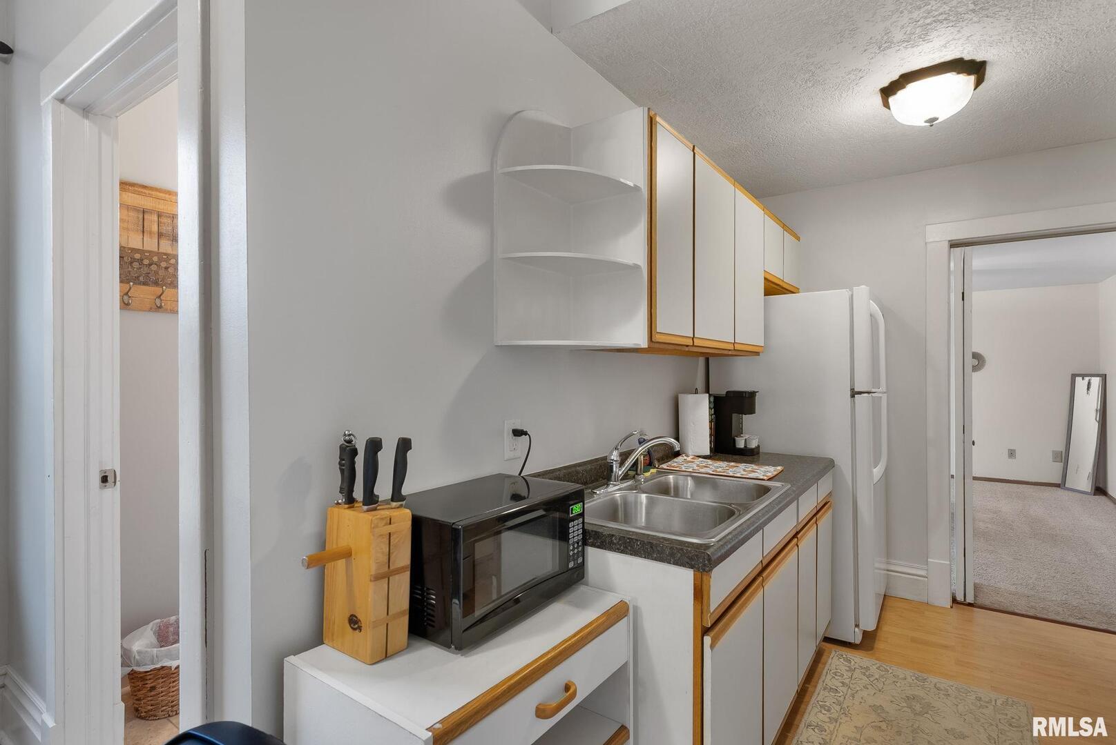 211 E LOCUST Street