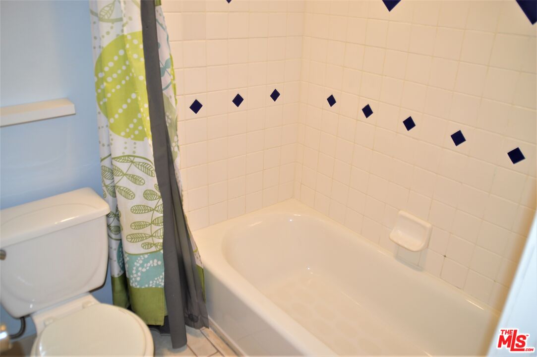 6050 CANTERBURY DR Unit: F205