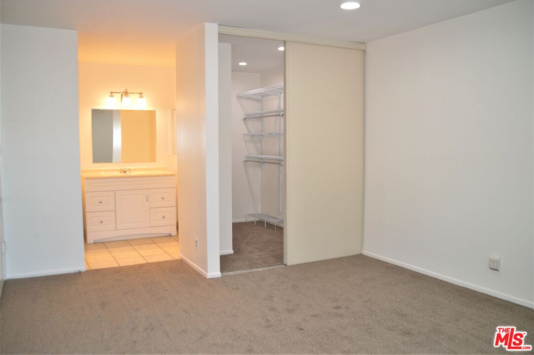 6050 CANTERBURY DR Unit: F205