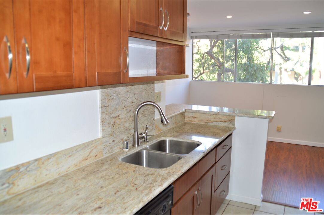 6050 CANTERBURY DR Unit: F205