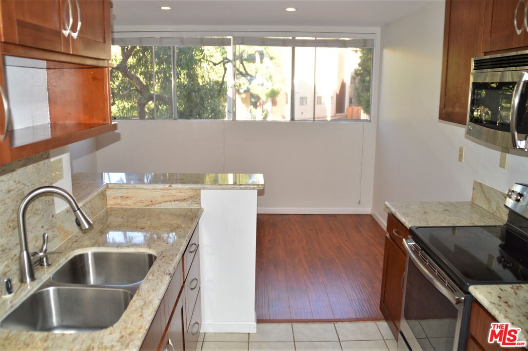 6050 CANTERBURY DR Unit: F205