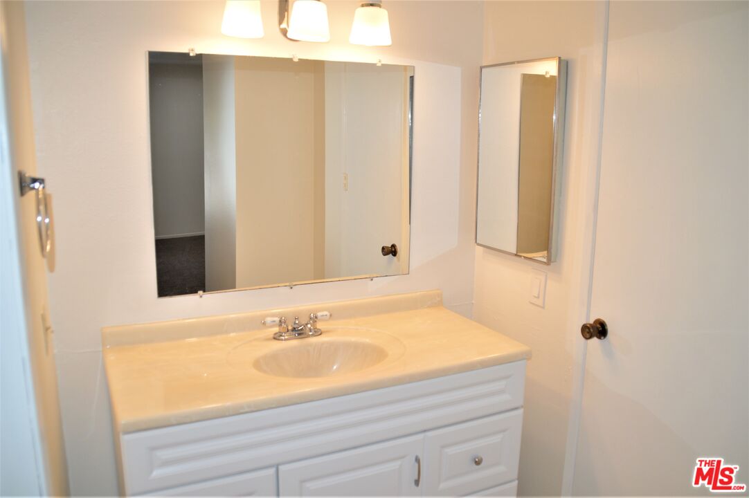 6050 CANTERBURY DR Unit: F205