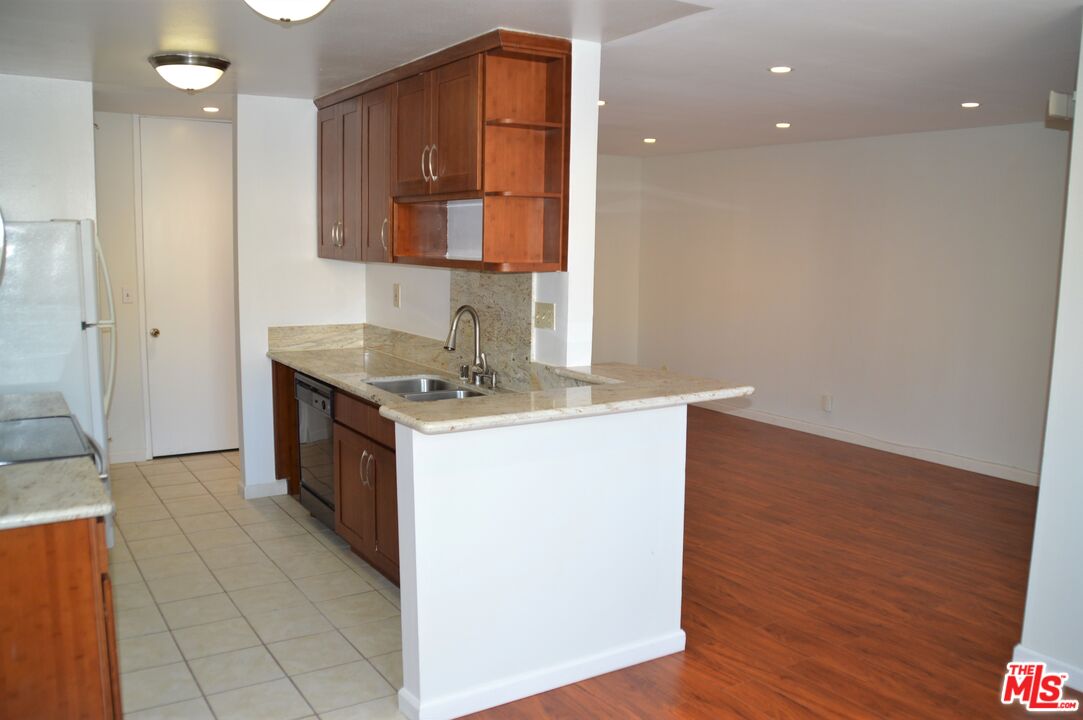6050 CANTERBURY DR Unit: F205