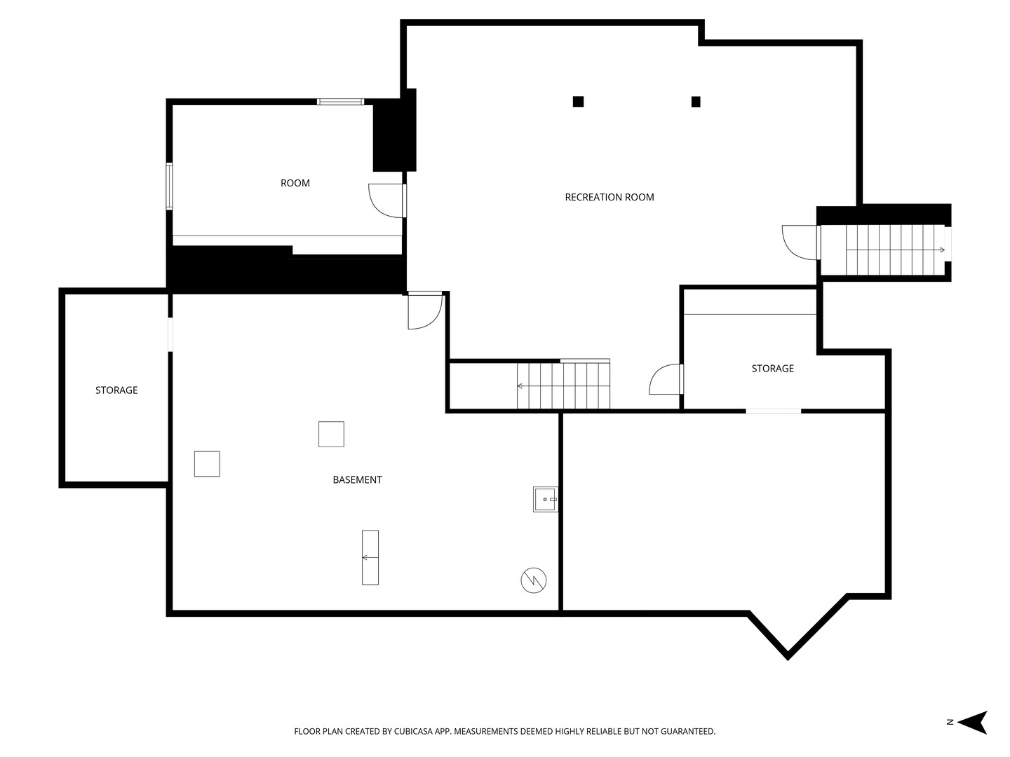 Basement floor plan with a recreation room, basement area, room, storage areas, and stairs.