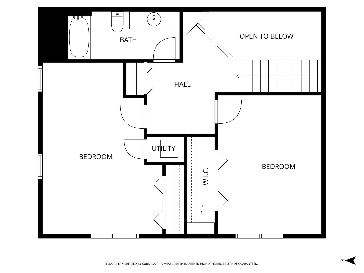 Second-floor plan with two bedrooms, a bathroom, utility area, walk-in closet, and stairs.