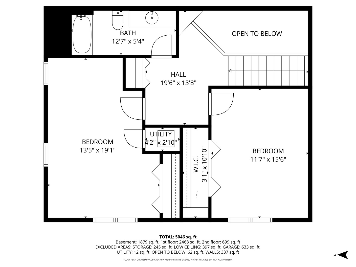 Second-floor plan with two bedrooms, a bathroom, walk-in closet, stairs, and open-to-below area.
