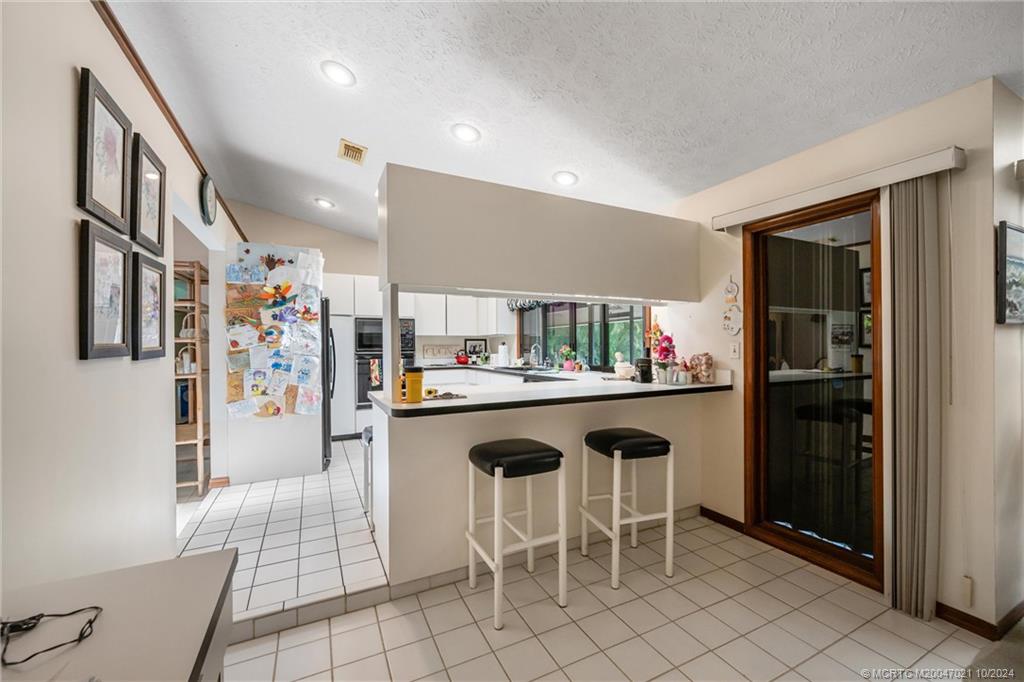 2190 NE Pinecrest Lakes Blvd