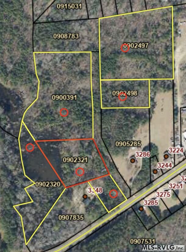 Aerial parcel map with outlined lots, parcel numbers, and red circled markers.