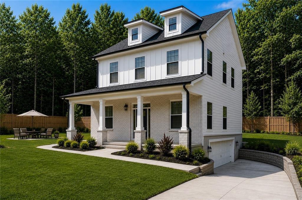 White two-story house with a covered porch, roof dormers, attached garage, and curved driveway.