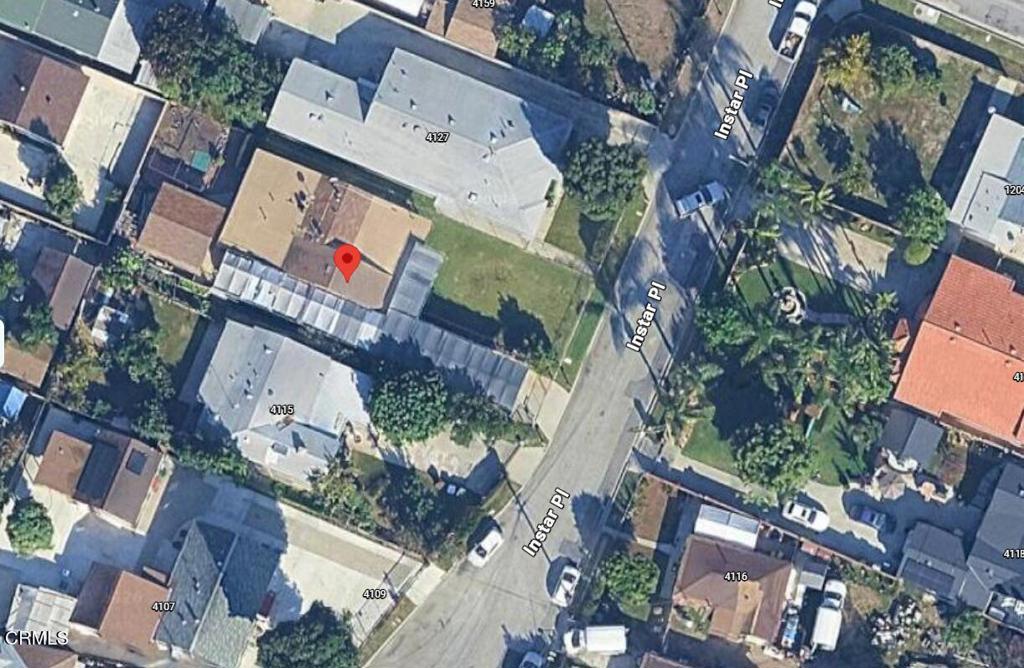 Aerial view of a home marked with a red pin beside Instar Pl.