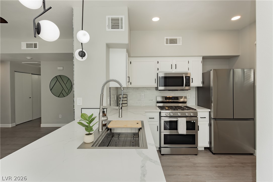 9050 West Warm Springs 1175