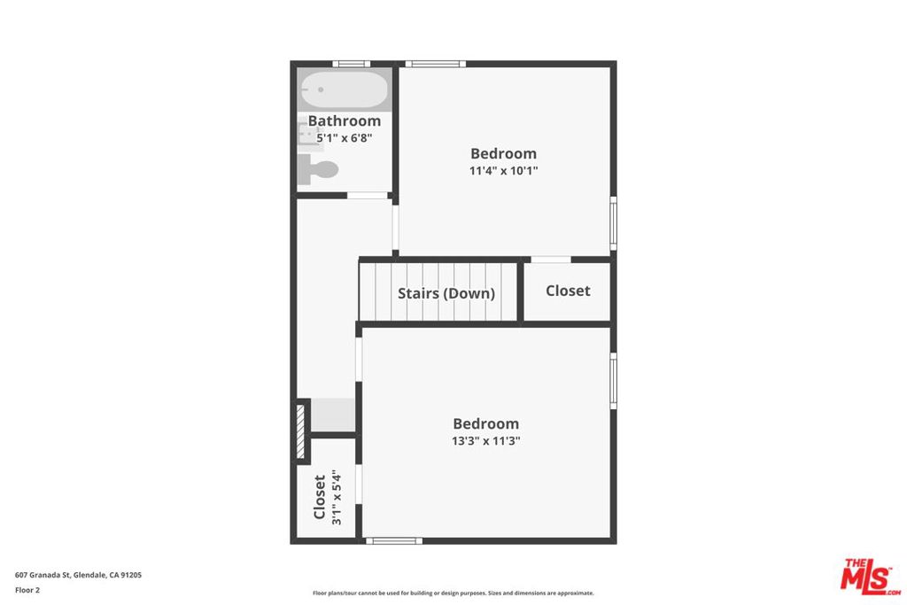 Second-floor floor plan showing two bedrooms, a bathroom, closets, and stairs.