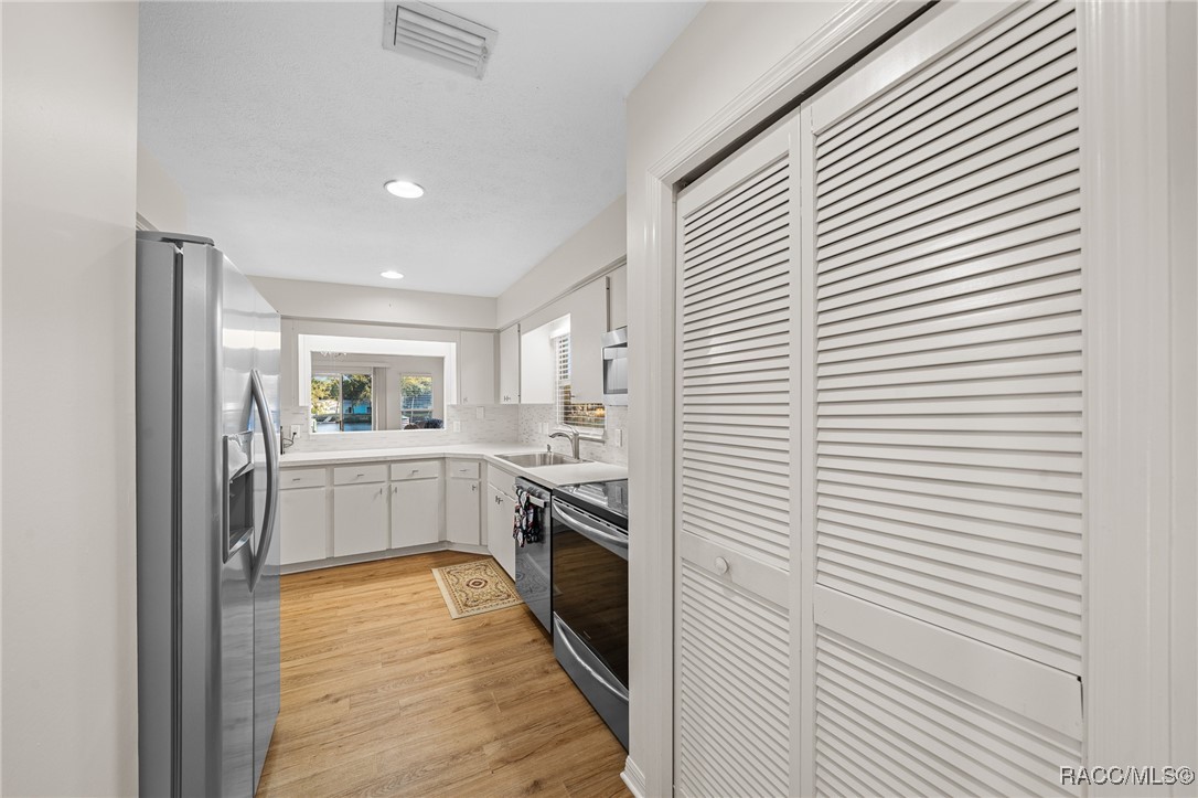11014 W Cove Harbor Drive