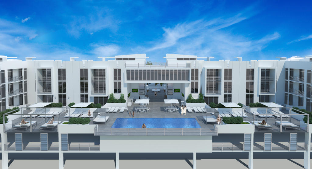 Contemporary condominium building with a rooftop swimming pool and lounge deck.
