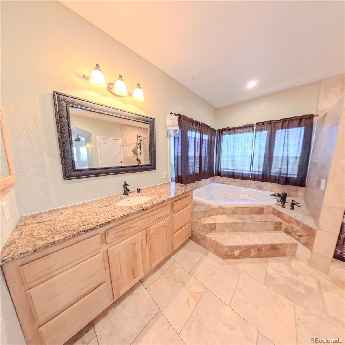 58989 E Chenango Place