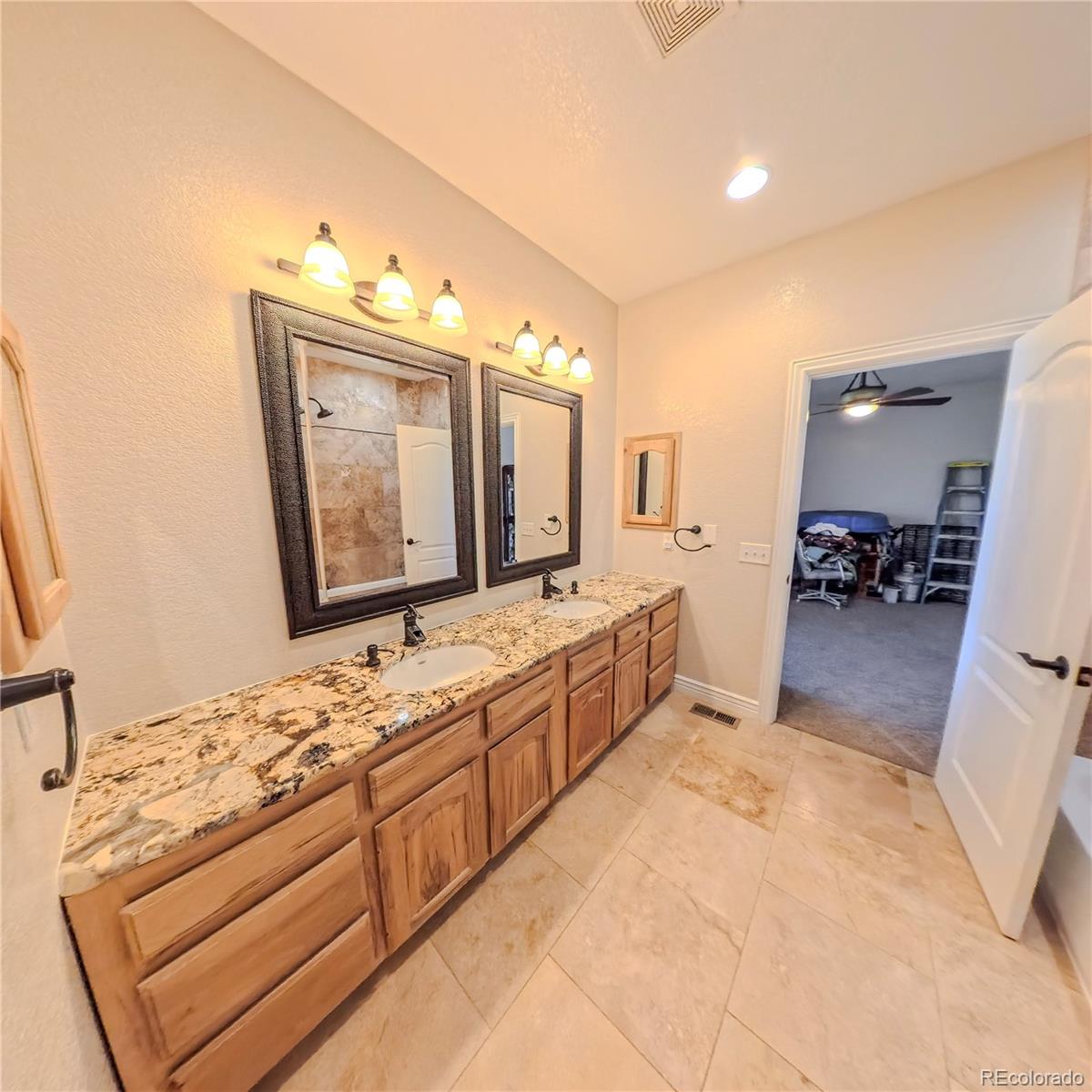 58989 E Chenango Place
