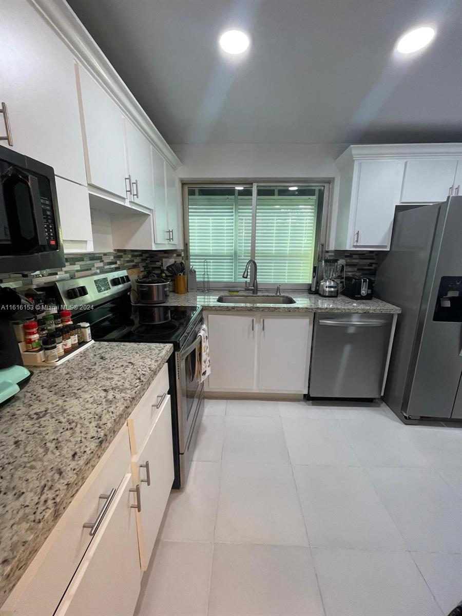 9081 Lime Bay Blvd # 211