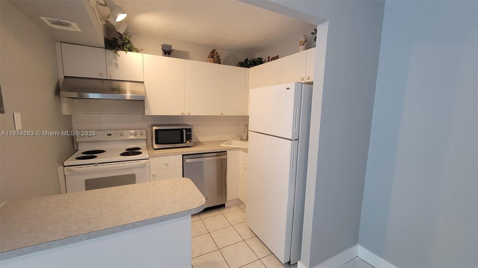 1 Jacaranda Country Club Dr # 104