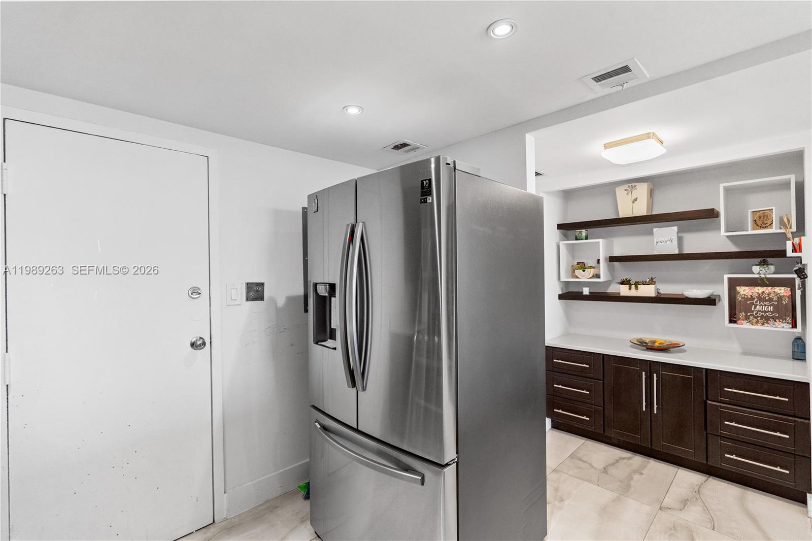 437 Golden Isles Dr # 11J