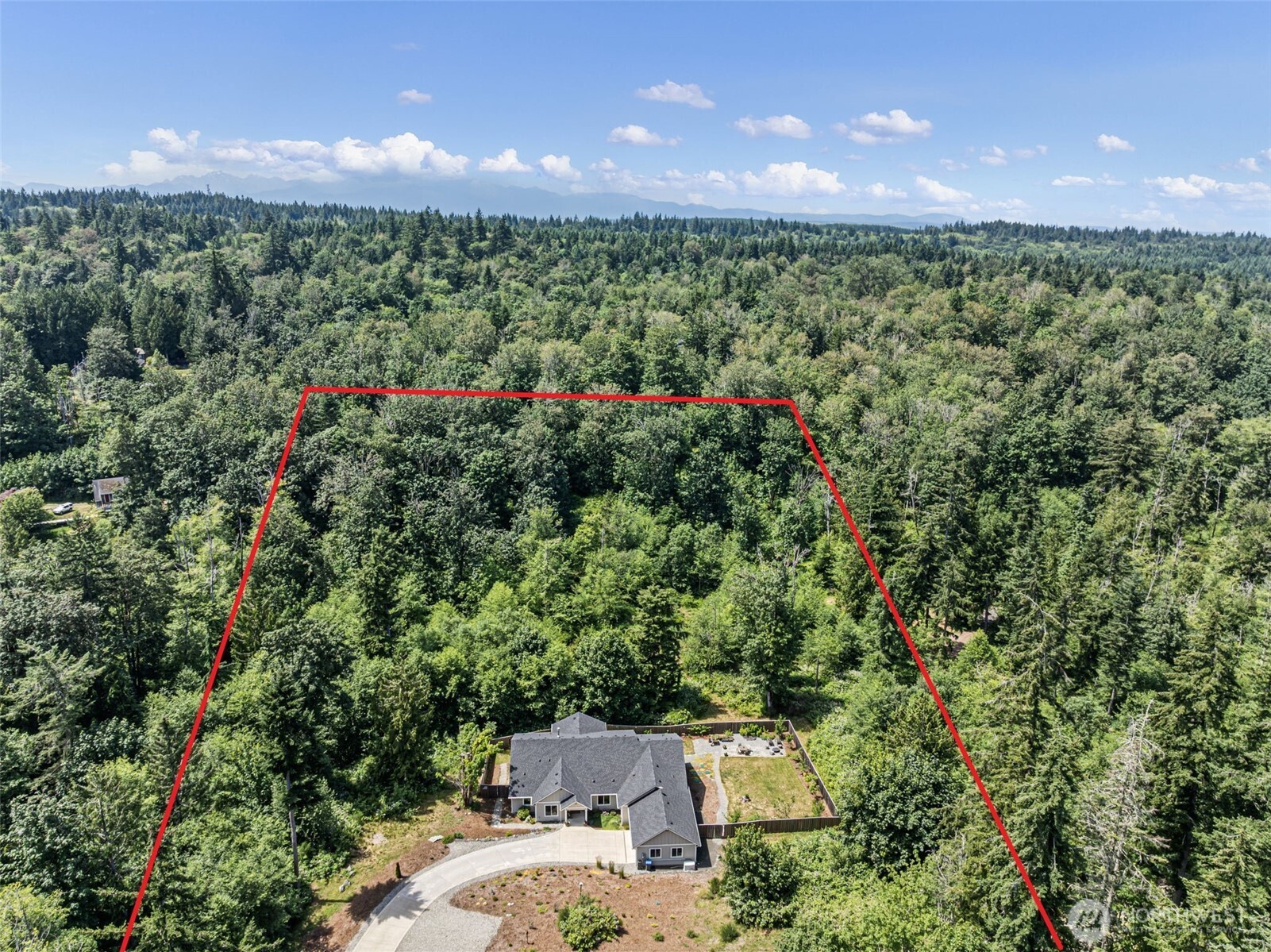 9236 NE Country Woods Lane
