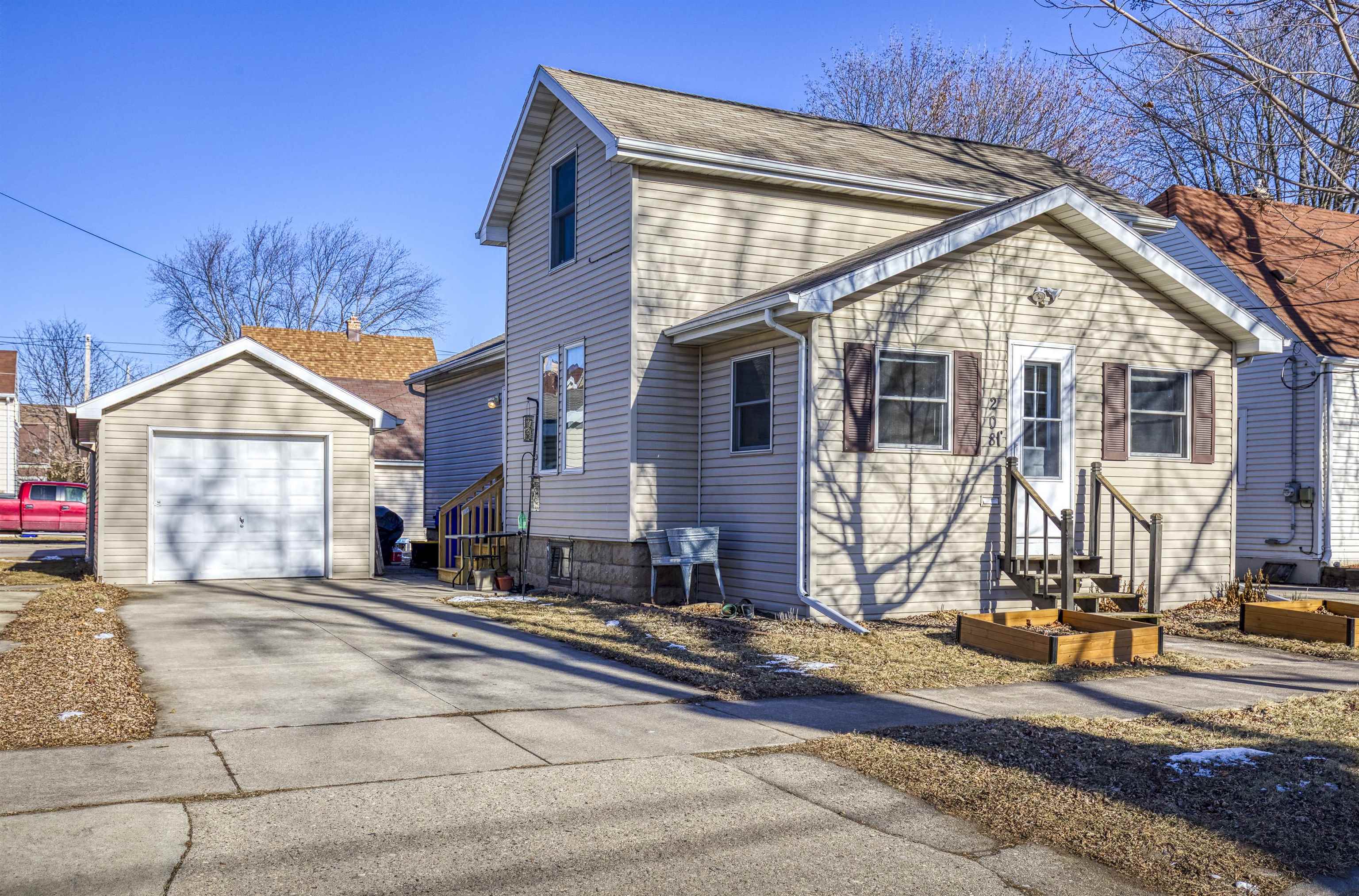 208 E COMMERCIAL Street