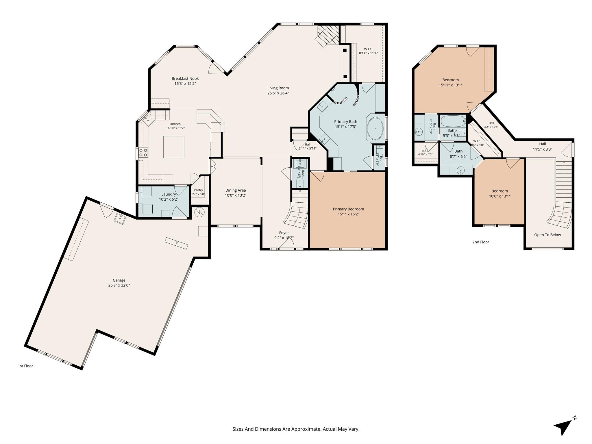 Two-story floor plan with a large first-floor garage, primary suite, and two upstairs bedrooms.