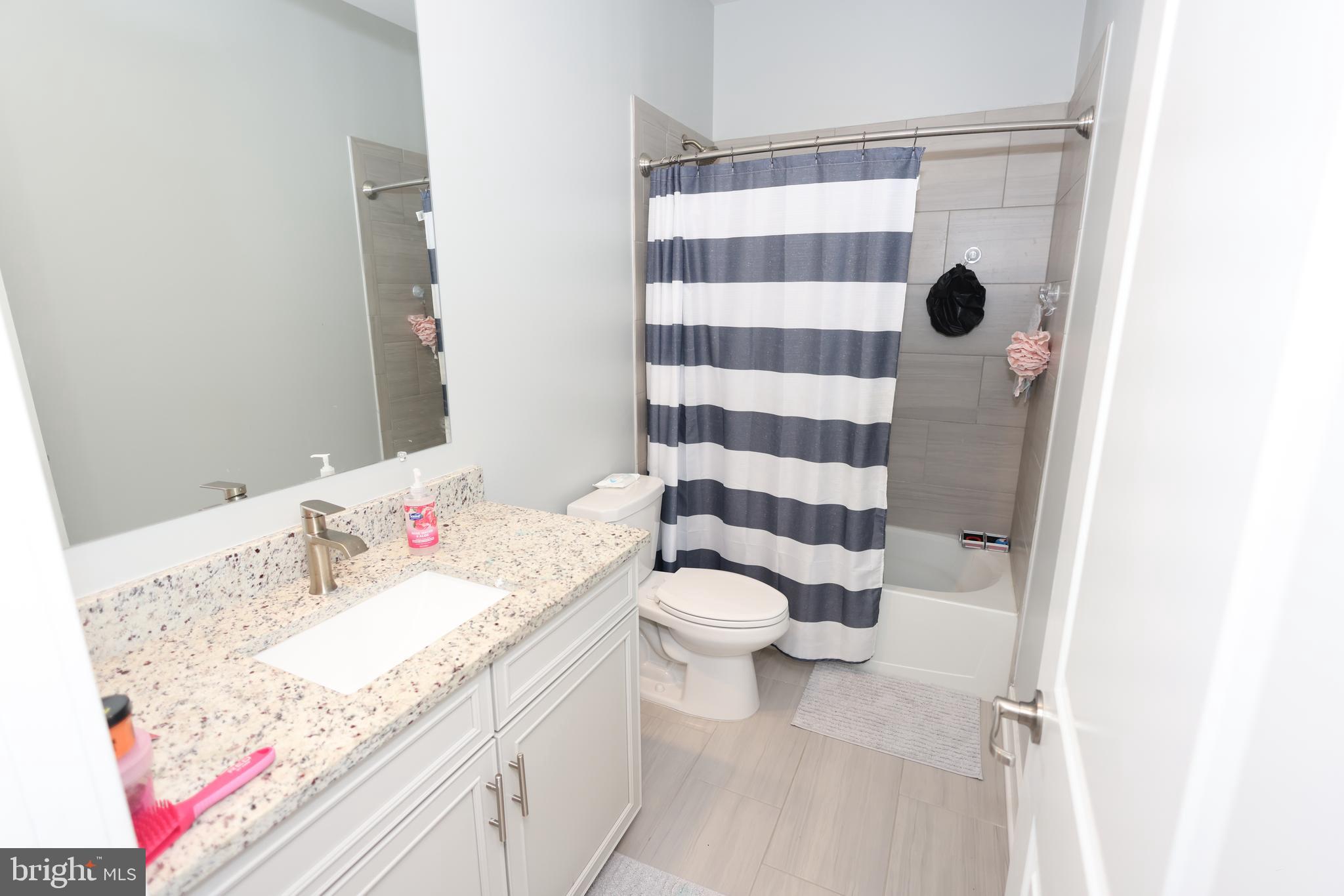 5676 LEWIS CARROLL DRIVE