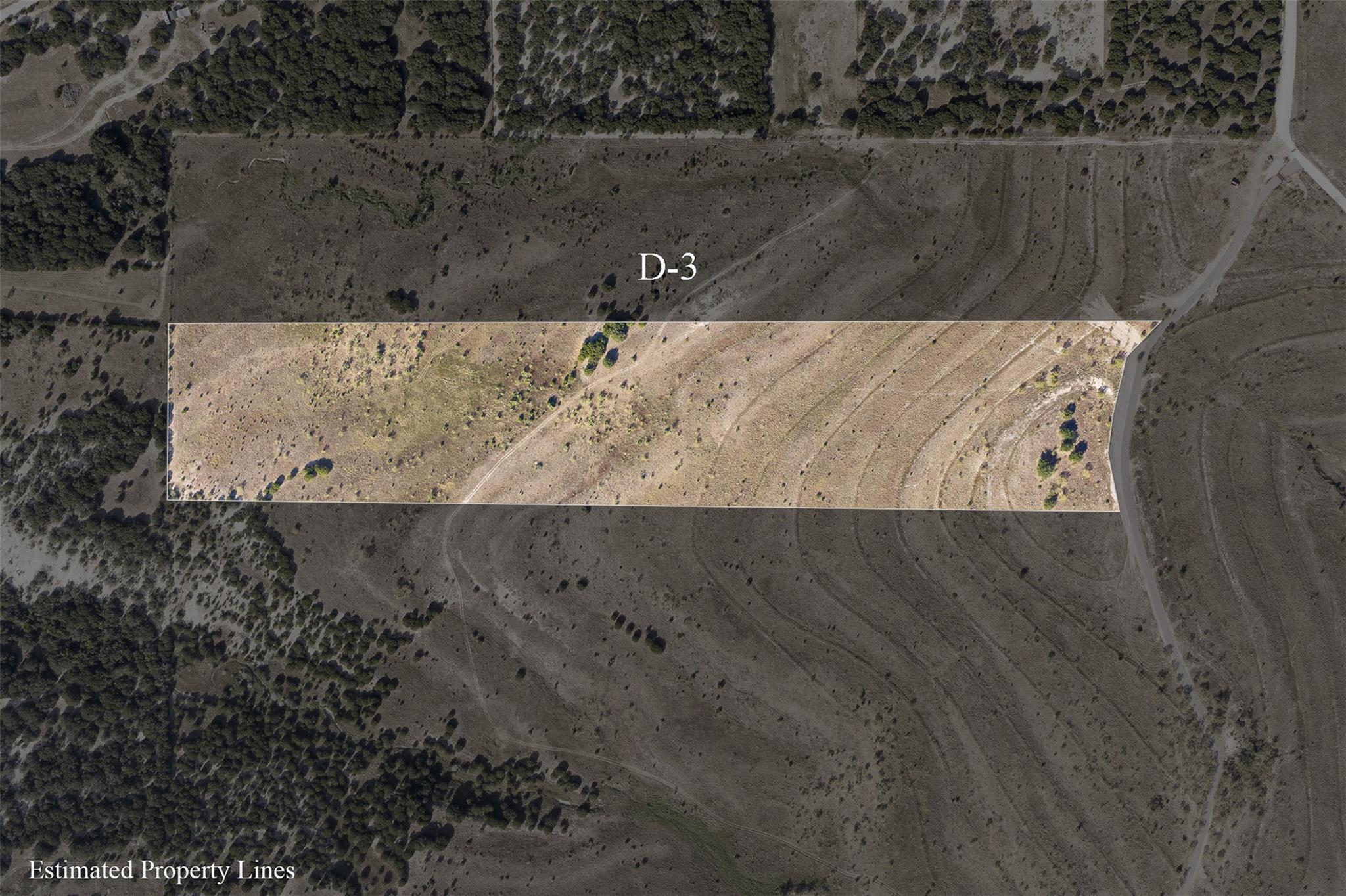 Aerial view of the outlined rural Lot D-3, showing open acreage and a roadside boundary.