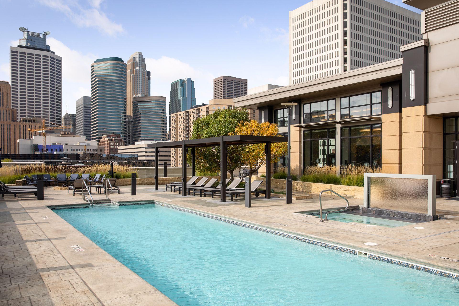 Rooftop pool and lounge terrace overlooking the Minneapolis skyline.