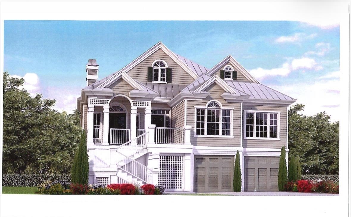 Two-story house rendering with a gray metal roof, balcony, exterior stairs, and two garage doors.