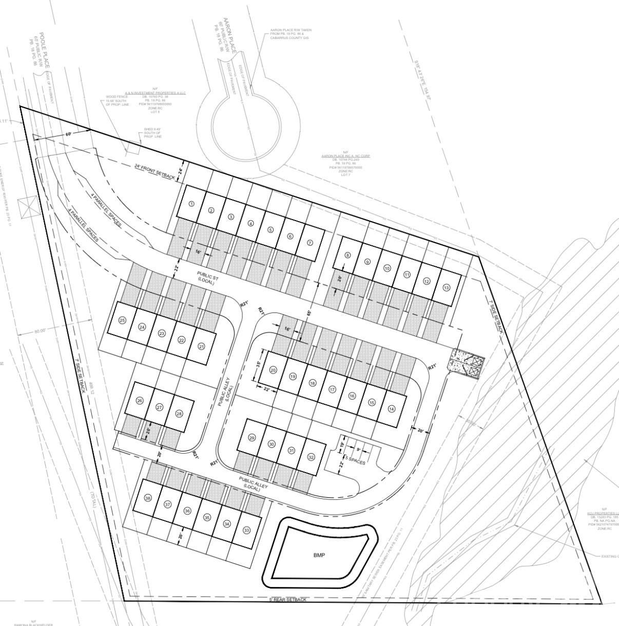 Subdivision site plan with numbered lots, internal alleys, setbacks, and a stormwater area.