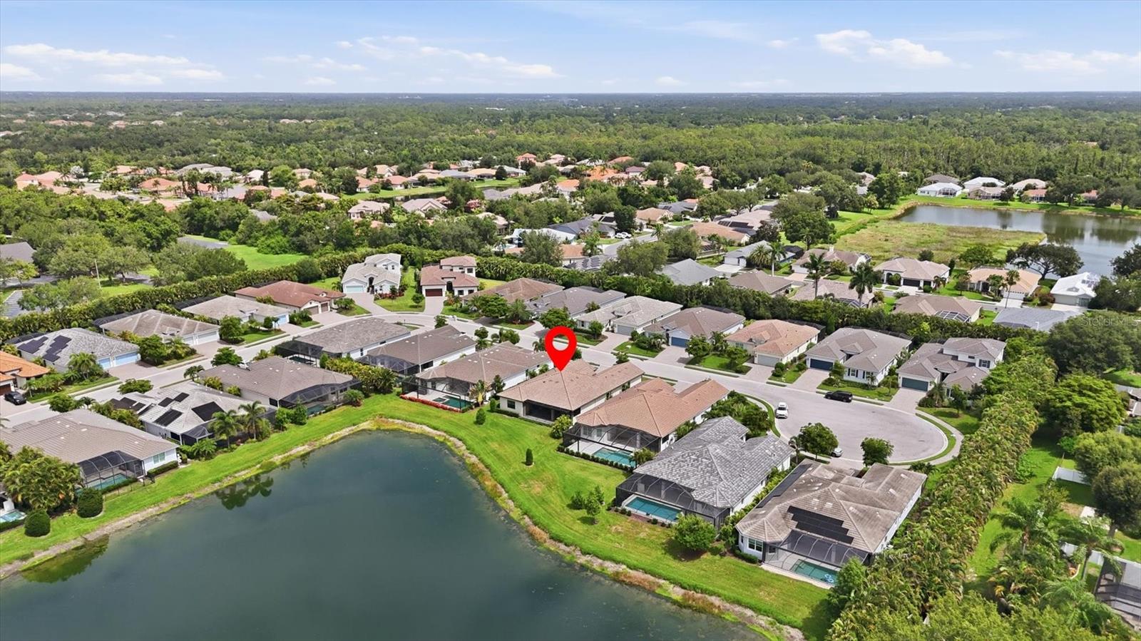 7712 SANDHILL LAKE DR