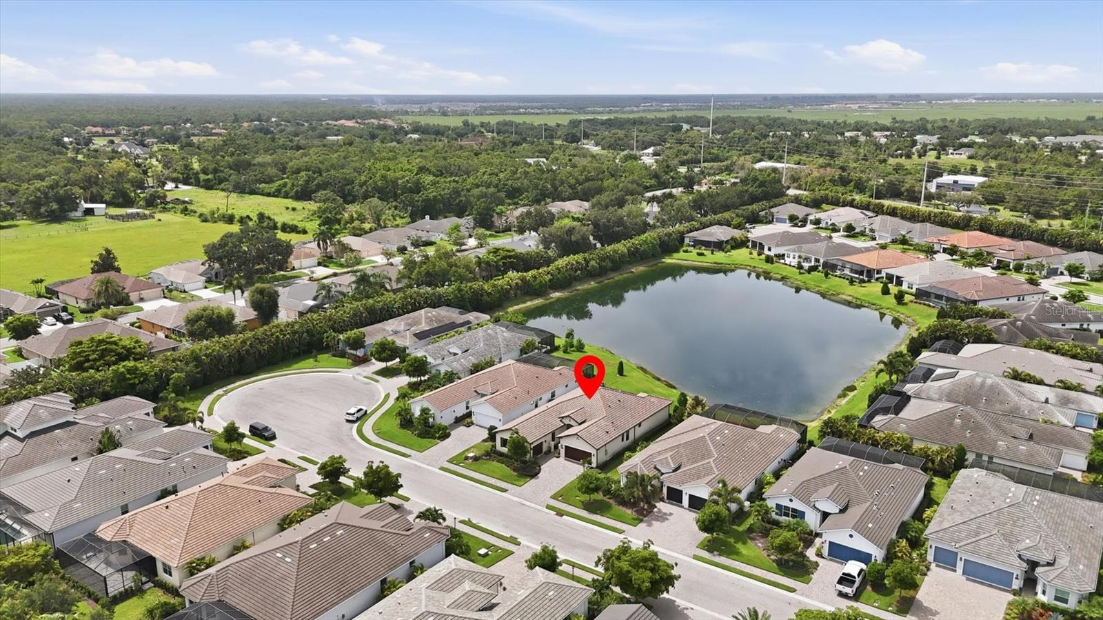 7712 SANDHILL LAKE DR