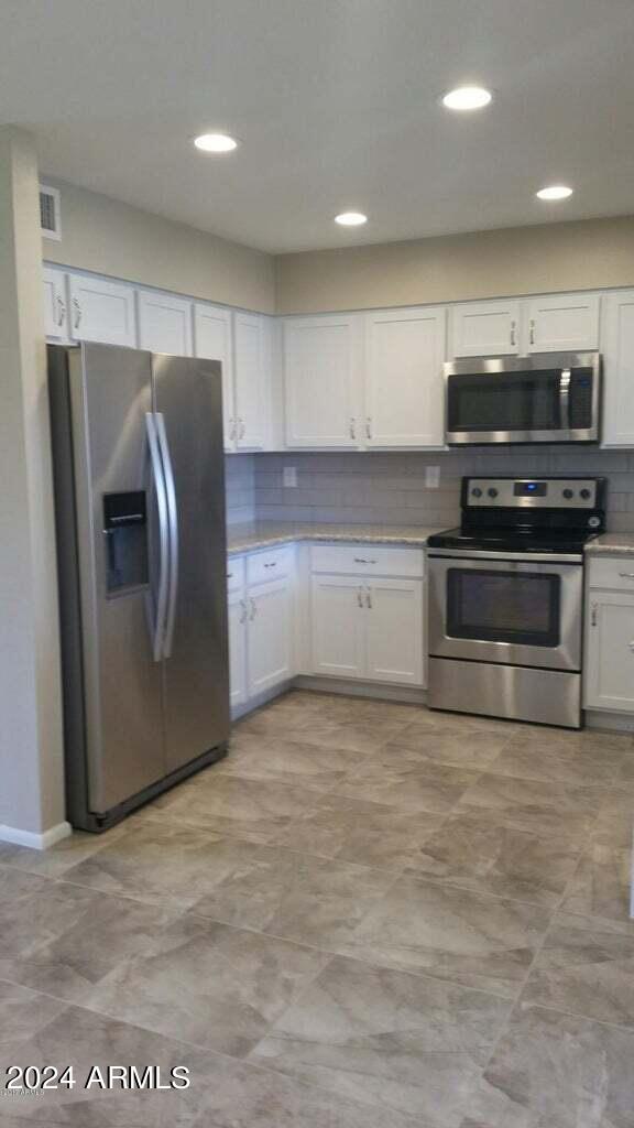 10929 W SANTA FE Drive