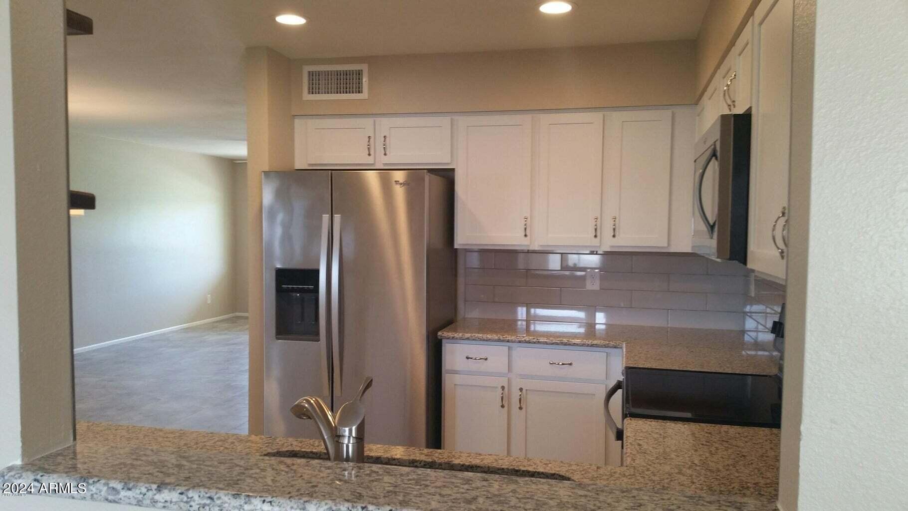 10929 W SANTA FE Drive
