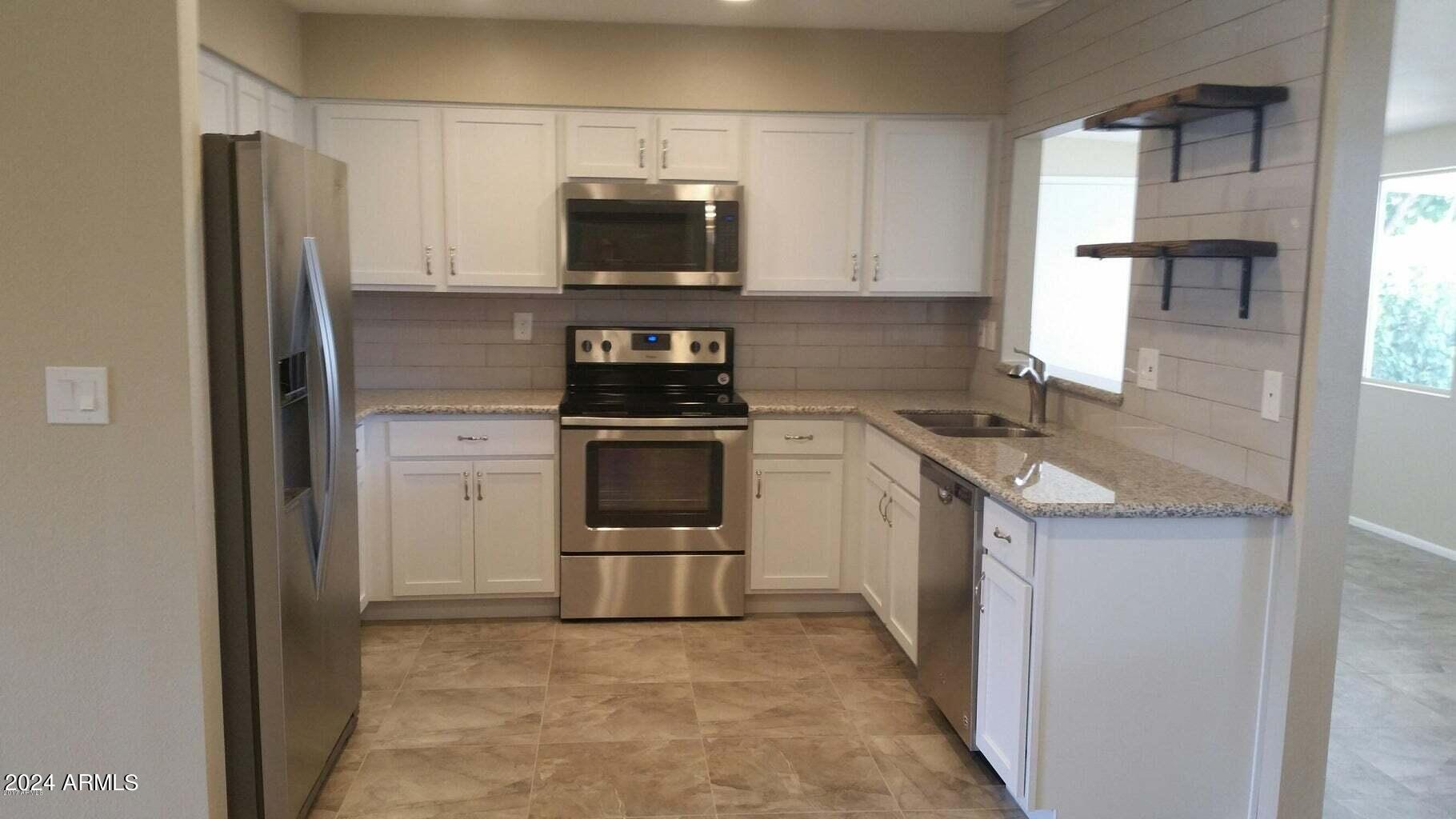 10929 W SANTA FE Drive