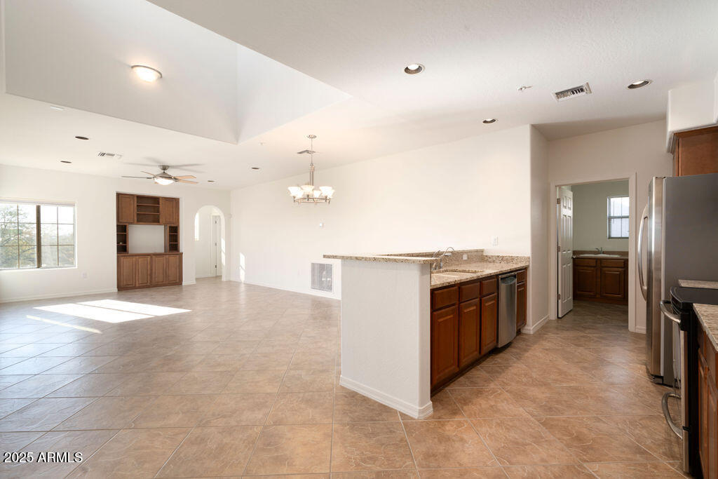 3935 E ROUGH RIDER Road, 1207