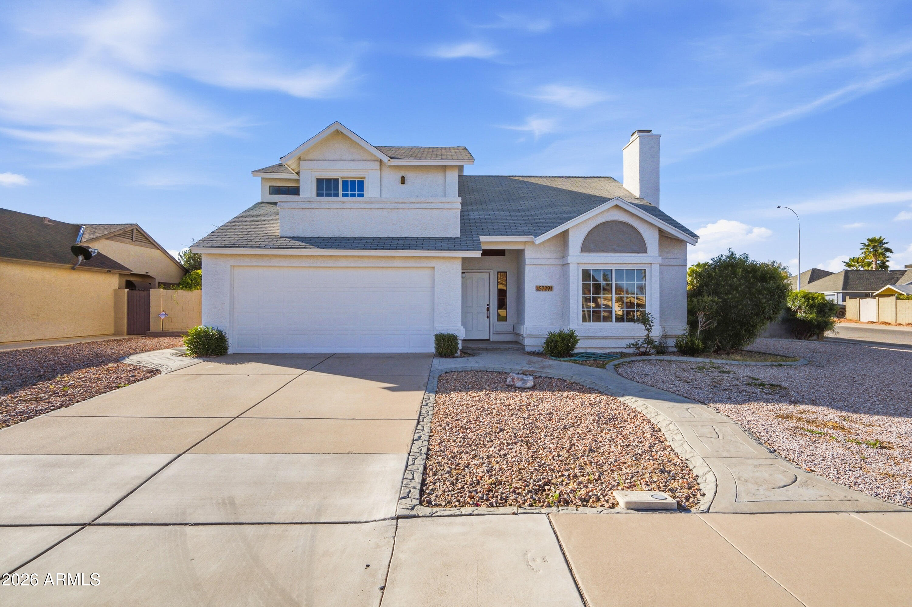 5729 W BUTLER Drive