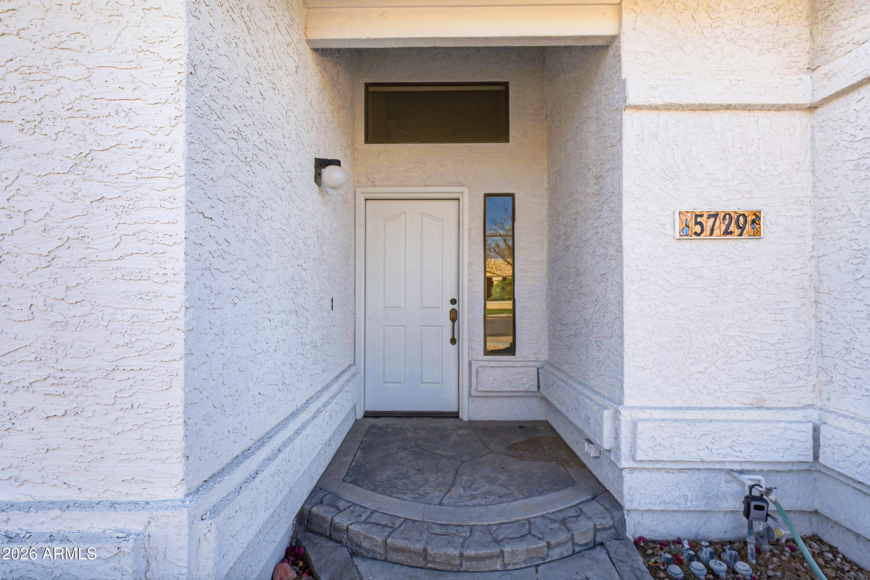5729 W BUTLER Drive